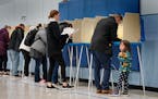 People vote at the Linwood Recreation Center on Nov. 8, 2022, in St. Paul.