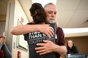 COVID survivor Rick Ulrich, of Norwood Young America, embraces critical care nurse Holly Vilione Thursday, May 11, 2023, at North Memorial Health Hosp