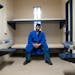 Carlos Sessions poses for a portrait in an empty cell Friday, May 12, 2023, at Lino Lakes Correctional Facility in Lino Lakes, Minn. Sessions has been