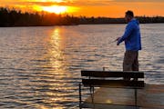 At sunrise Saturday, Mark Strelnieks of Victoria tossed a lure into Moose Lake, home of Paradise Resort, while fishing Upper Red Lake on opening day o