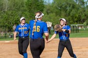 St. Michael-Albertville players Anika Rogers (3), Taylor Tschida (16) and Khendal Johnson enjoyed a moment during the eighth-ranked Knights’ 4-1 vic