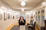 Groveland Gallery Director Sally Johnson shares a smile inside her favorite exhibit room at the gallery in Minneapolis, Minn., on Thursday, May 18, 20
