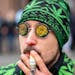 The bill would legalize the possession and use of marijuana for Minnesotans 21 and older. Here, Andrew “Reefer Man” Sumner smoked during Hash Bas