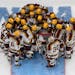The Gophers huddled around goalie Justen Close before their NCAA championship loss to Quinnipiac on April 8 at Amalie Arena in Tampa.