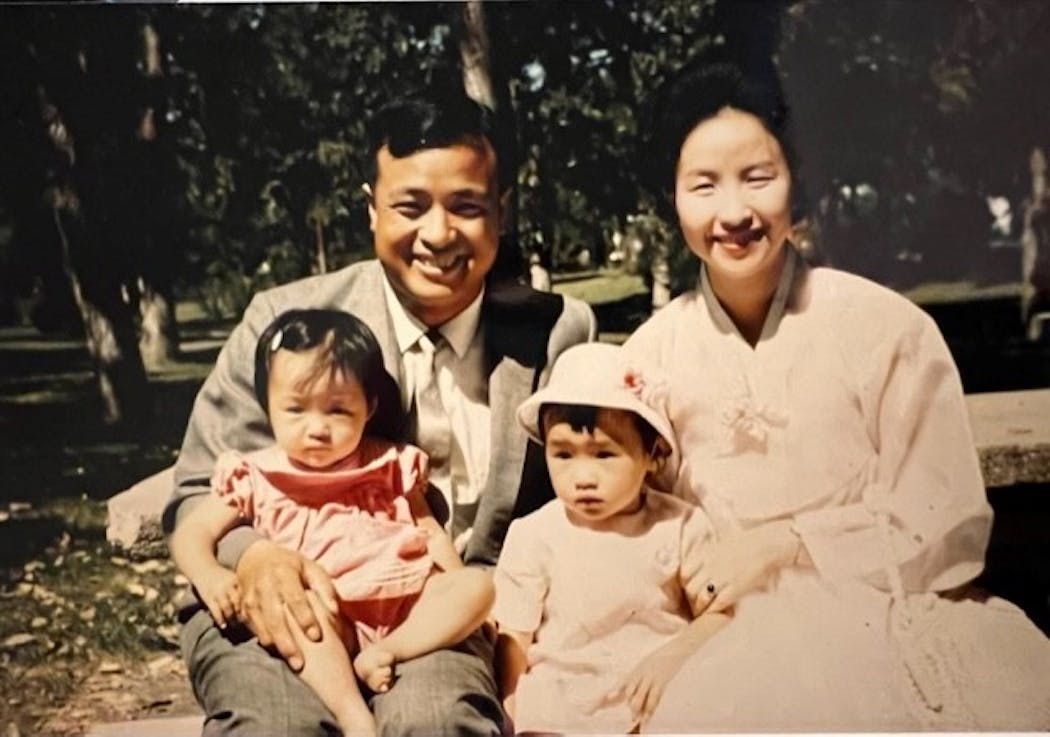 The Ha family posed for a picture after Martha, mother Young and sister Mary immigrated to the United States to be reunited with father Jae.