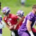 Vikings first-round draft pick Jordan Addison, left, was held out of Tuesday’s practice for undisclosed reasons. 