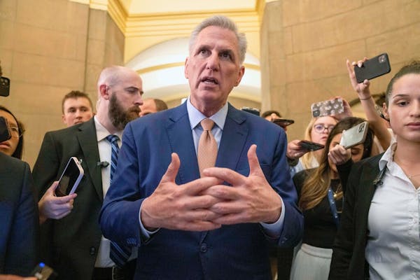 House Speaker Kevin McCarthy of Calif., speaks to reporters, Tuesday, May 23, 2023, as returns to his office from the House floor on Capitol Hill in W