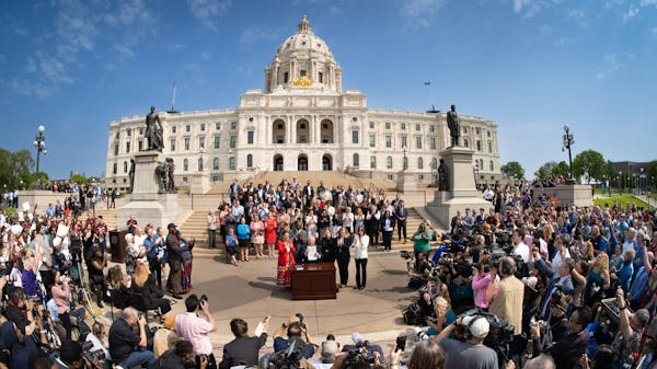 Gov. Walz, Democrats and advocates celebrate budget on Capitol steps