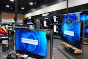 Televisions from various manufactures sit on display at Best Buy’s “experience store” in Minnetonka in March of 2023. 