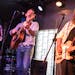 Trevor McSpadden, center, and Mary Cutrufello picked through classic country tunes last week at St. Paul’s White Squirrel Bar with bassist Dan Lowin