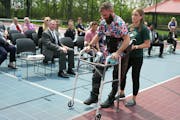 Veteran Wesley Farwell used the robotic device with the help of physical therapist Crystal Stien on May 22, at a ceremony to celebrate the donation.