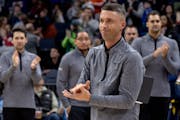 Denver assistant coach Ryan Saunders was acknowledged by the Target Center crowd before a game against the Wolves last season.
