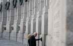 President Joe Biden and first lady Jill Biden visit the National World War II Memorial to mark the 80th anniversary of the Japanese attack on Pearl Ha