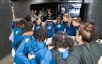 The Minnesota Lynx huddle in the tunnel ahead of their first preseason game against the Washington Mystics Friday, May 05, 2023, at Target Center in M