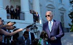 President Joe Biden talks with reporters on the South Lawn of the White House in Washington, Friday, May 26, 2023, as he heads to Camp David for the w