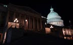 Lights illuminate the capitol after House Speaker Kevin McCarthy of Calif., announced that he and President Joe Biden and McCarthy had reached an “a