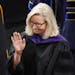 Former U.S. Rep. Liz Cheney, R-Wyo., waves before delivering the commencement address at Colorado College, Sunday, May 28, 2023, in Colorado Springs, 