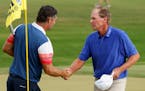 Padraig Harrington, left, shook hands with Steve Stricker before a playoff won by Stricker for the Senior PGA Championship in Frisco, Texas, on Sunday