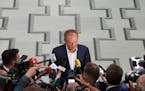 Poland’s opposition leader and former prime minister, Donald Tusk, talks to reporters in Warsaw, Poland, Friday, May 26, 2023.