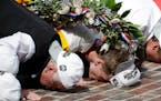 Roger Penske and Josef Newgarden kissed the bricks after Newgarden won the Indianapolis 500 on Sunday.