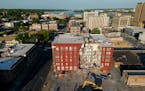 An apartment building that partially collapsed two days earlier can be seen Tuesday, May 30, 2023, in Davenport, Iowa. 
