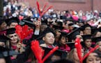 Harvard University students celebrate their graduate degrees in public health during commencement ceremonies, Thursday, May 25, 2023, in Cambridge, Ma