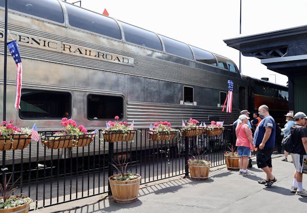 Passengers waited to board a North Shore Scenic Railroad train car Wednesday at the Duluth Depot. The Depot station would handle arrivals of the North