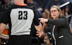 Minnesota Lynx head coach Cheryl Reeve discusses a foul call with an official in the first half against Connecticut Thursday, June 1, 2023, at Target 