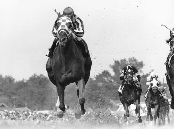 Secretariat, with jockey Ron Turcotte, started the Triple Crown with a record ride at the 99th Kentucky Derby.
