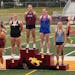Evelyn Wiltrout grinned from the second spot on the medal stand Friday, the position she needed to claim to qualify for state.