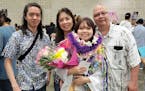 Jarek Agcaoili, left, with his mother Danielle, sister Jessika and father Maury Agcaoili in May 2023, at Jessika’s high school graduation in Hawaii.