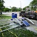 The remains of a bus stop destroyed during a police chase Monday at Olson Memorial Highway and Penn Avenue North in Minneapolis. At least five people,