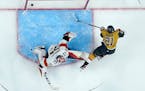 Vegas Golden Knights center Brett Howden scores around Florida Panthers goaltender Sergei Bobrovsky during the second period of Game 2 of the NHL Stan