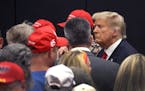 Former President Donald Trump greets supporters at a Team Trump volunteer leadership training event held at the Grimes Community Complex on June 1, 20