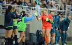 Minnesota Aurora goalkeeper Amanda Poorbaugh bumped fists with teammates during the team’s 5-0 season-opening victory against Rochester FC on May 23