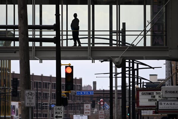 A security guard watched over Hennepin Avenue in downtown Minneapolis in April 2021.