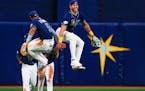 Tampa Bay Rays shortstop Wander Franco and centerfielder Jose Siri celebrate after beating the Toronto Blue Jays at Tropicana Field on May 24, 2023, i