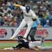 Michael A. Taylor of the Twins stole third in the ninth inning Wednesday as Rays third baseman Isaac Paredes avoided him.