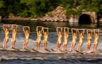 The ballet line of the Twin Cities River Rats take to the water in their second show of the season on the Mississippi in Minneapolis, Minn., on Thursd