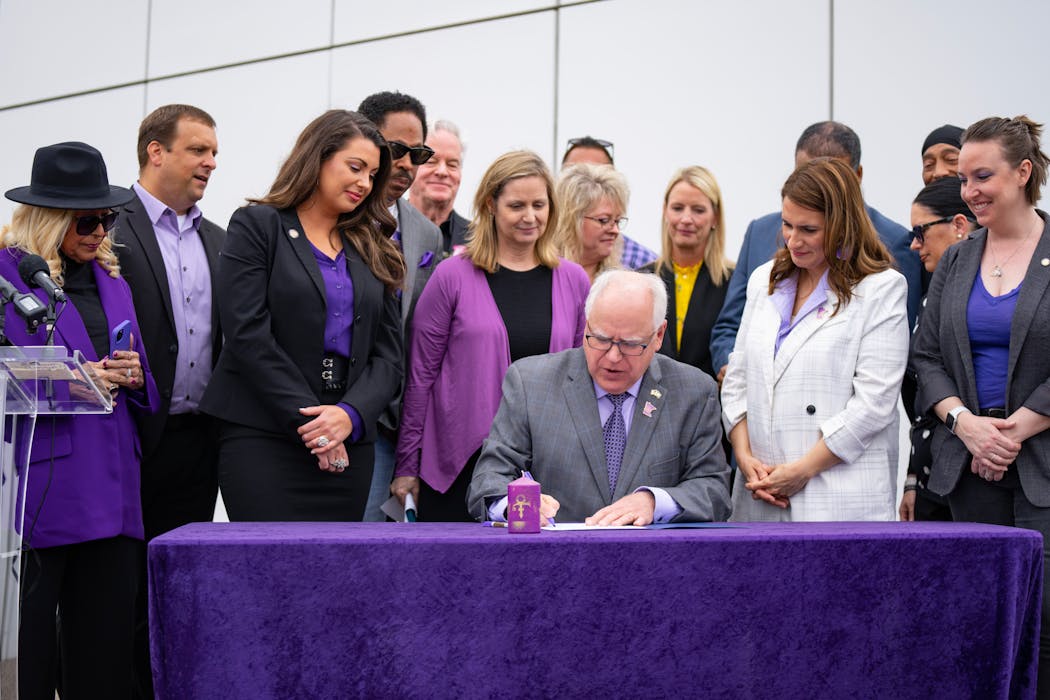 Gov. Tim Walz signed a bill renaming a portion of Highway 5 after Prince in May 2023 at Paisley Park.