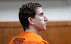 Bryan Kohberger, who is accused of killing four University of Idaho students in November 2022, listens during his arraignment hearing in Latah County 