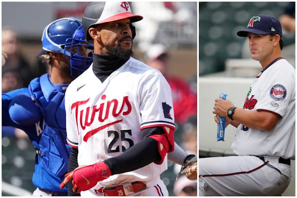 Byron Buxton returned to the dugout after stirking out during a game earlier this season. Doug Mientkiewicz (right) was a Twins first baseman and mino
