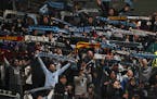 Minnesota United fans celebrate at the end of an MLS soccer match in Portland, Oregon, Sunday, Mar. 1, 2020. (STEVE DIPAOLA/Special to the Star Tribun