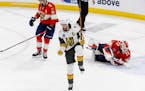 Vegas Golden Knights’ Mark Stone reacts after teammate Jonathan Marchessault, not pictured, registered a first-period against the Florida Panthers d