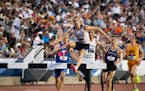 The Gophers’ Matt Wilkinson, right, finished fifth in the 3,000-meter steeplechase on Friday night at the NCAA outdoor track and field championships