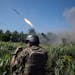 Soldiers with Ukraine’s 110th Separate Mechanized Brigade fire at Russian positions in the Donetsk region of eastern Ukraine on Wednesday, June 7, 2