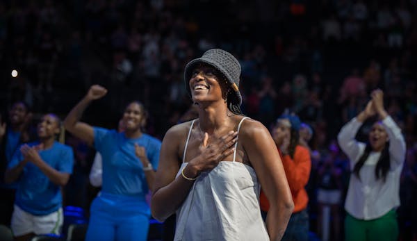 Former Minnesota Lynx center Sylivia Fowles look up at the rafters as her number 34 was retired at Target Center Sunday June 11,2023 in Minneapolis.] 