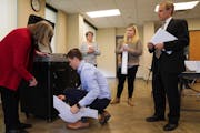 Minnesota Secretary of State Steve Simon, right, watched as local election officials conducted mandatory public testing of voter machines in 2018.