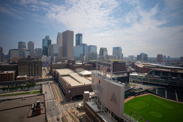 A view of Target Field and the central business district from the 18th floor of the residential tower that is a component of the North Loop Green deve