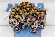 The Gophers huddled before the NCAA championship game against Quinnipiac on April 8 in Tampa, Fla.